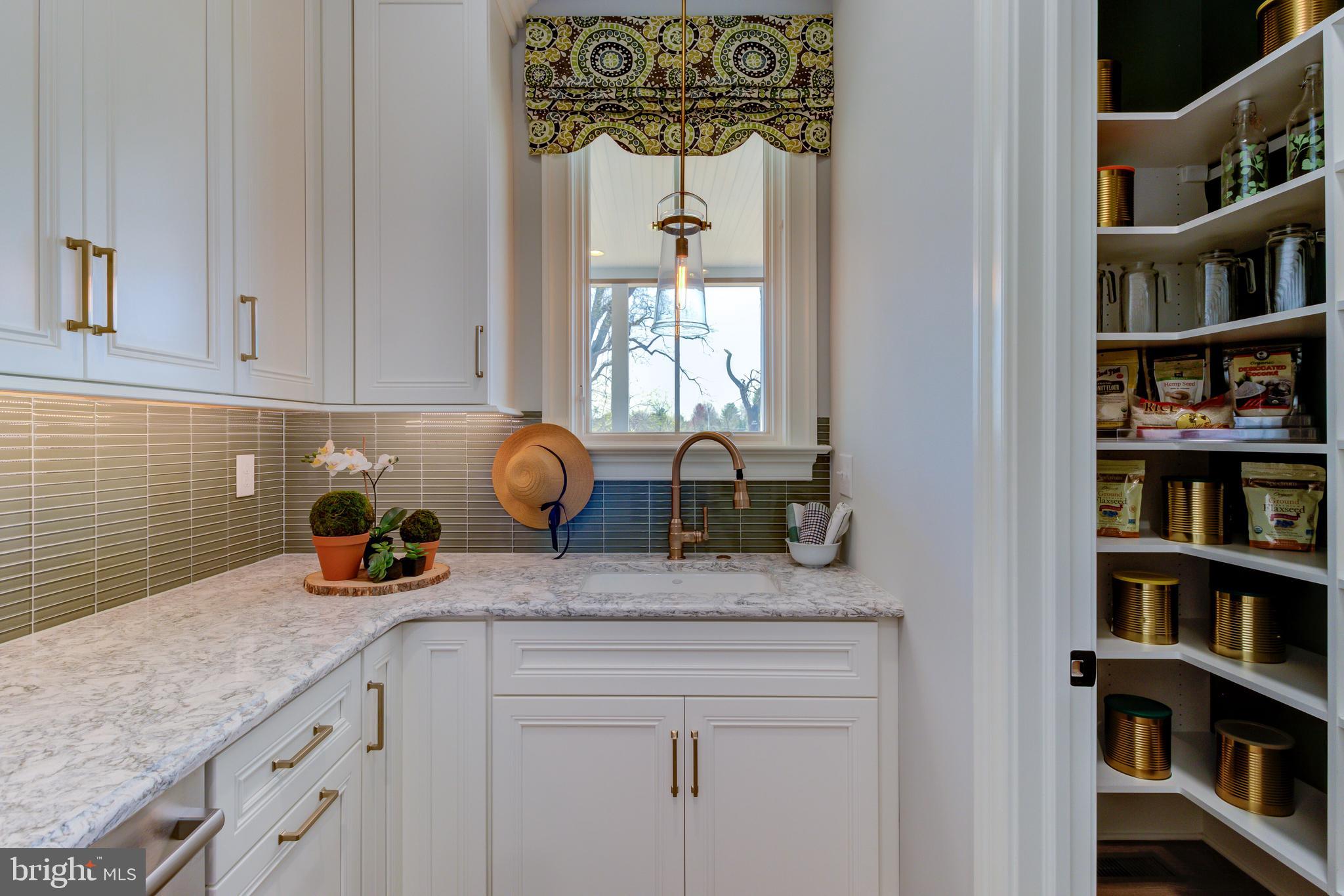 39 Old Covered Bridge Road Newtown Square, PA 19073 - Photo 8 of 19 a kitchen with stainless steel appliances granite countertop a sink a cabinets and a window