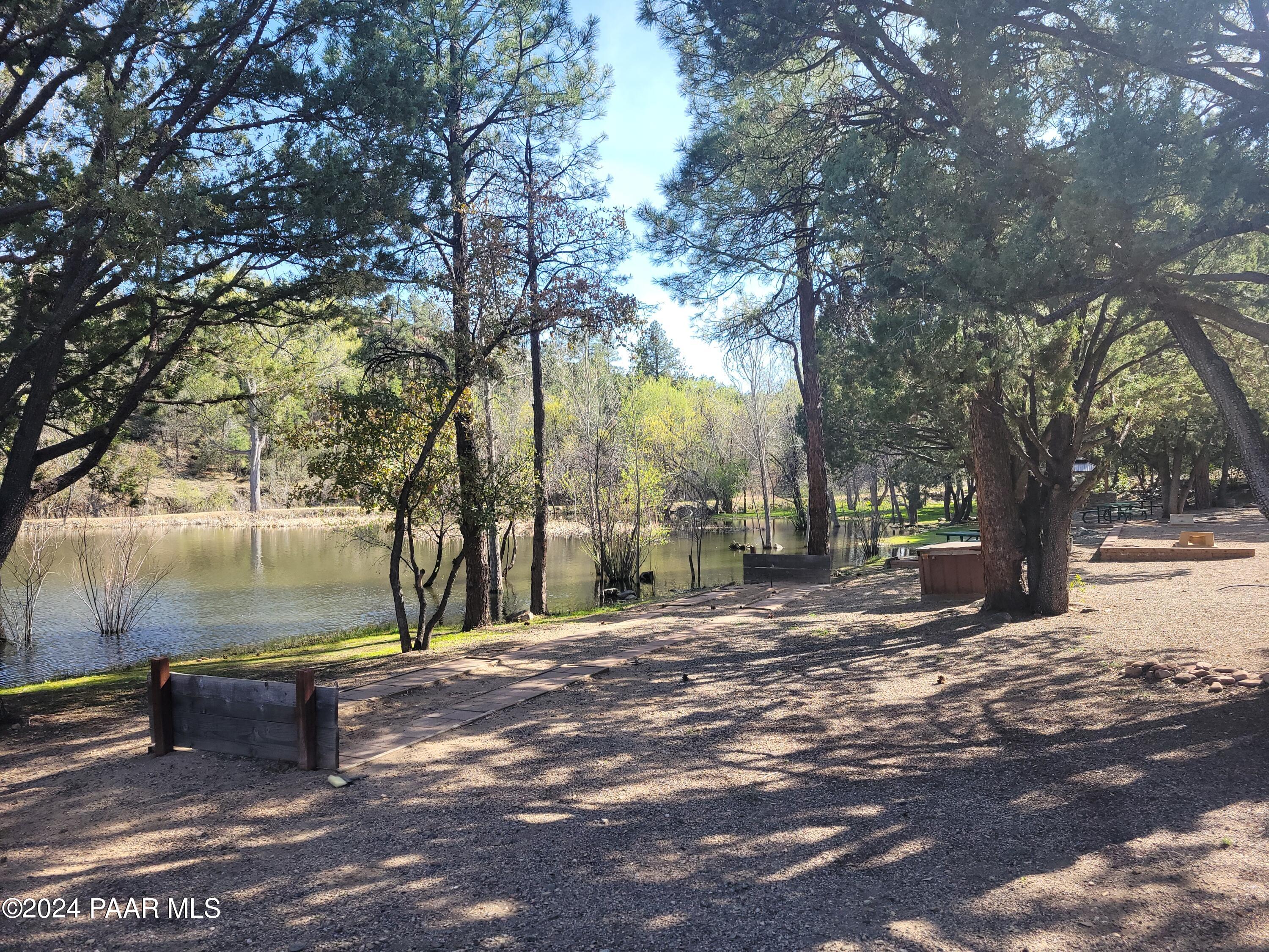 99 Alpine Prescott, AZ 86305 - Photo 24 of 25 a view of a yard with a tree