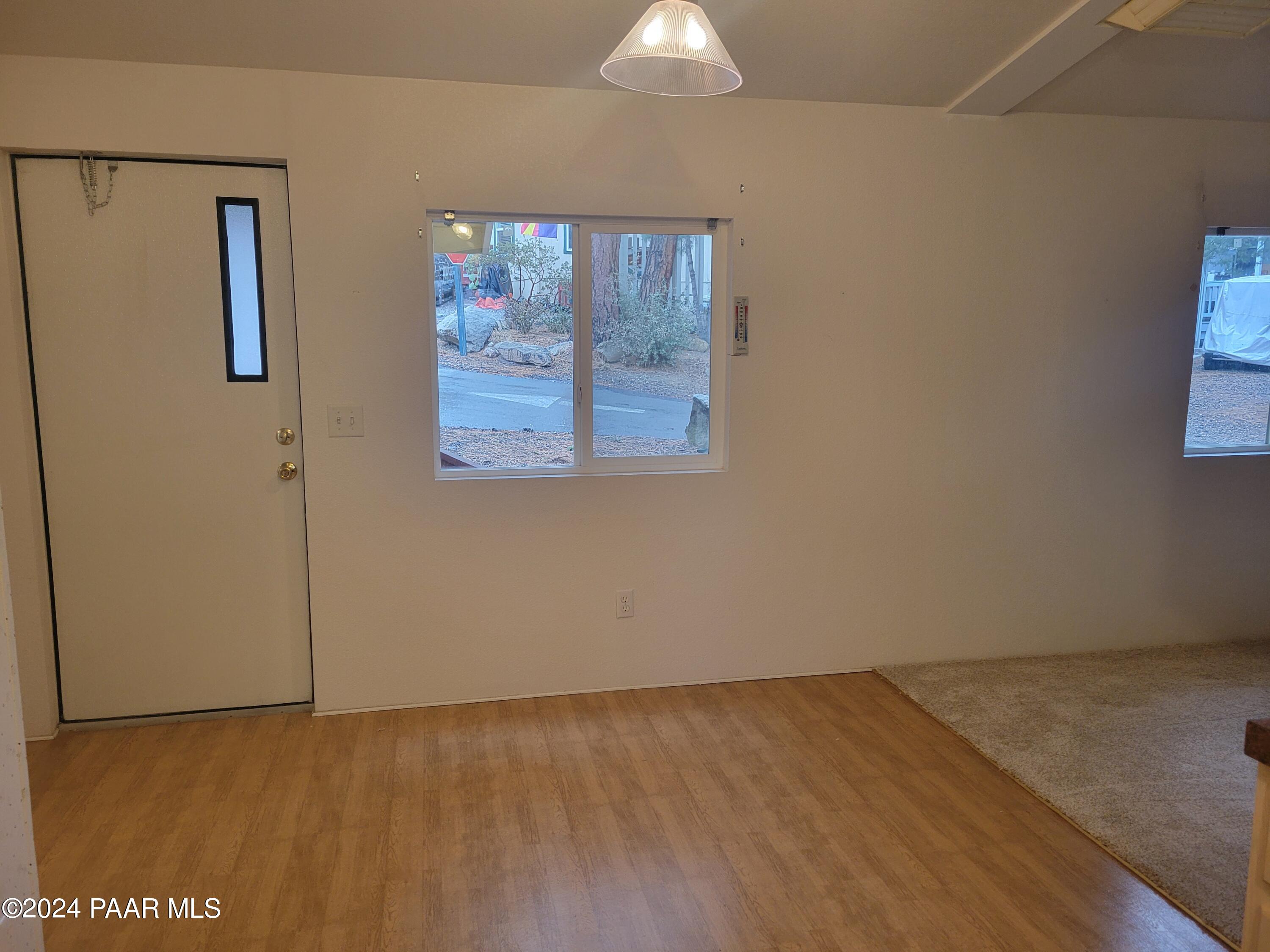 99 Alpine Prescott, AZ 86305 - Photo 4 of 25 a view of an empty room with a window