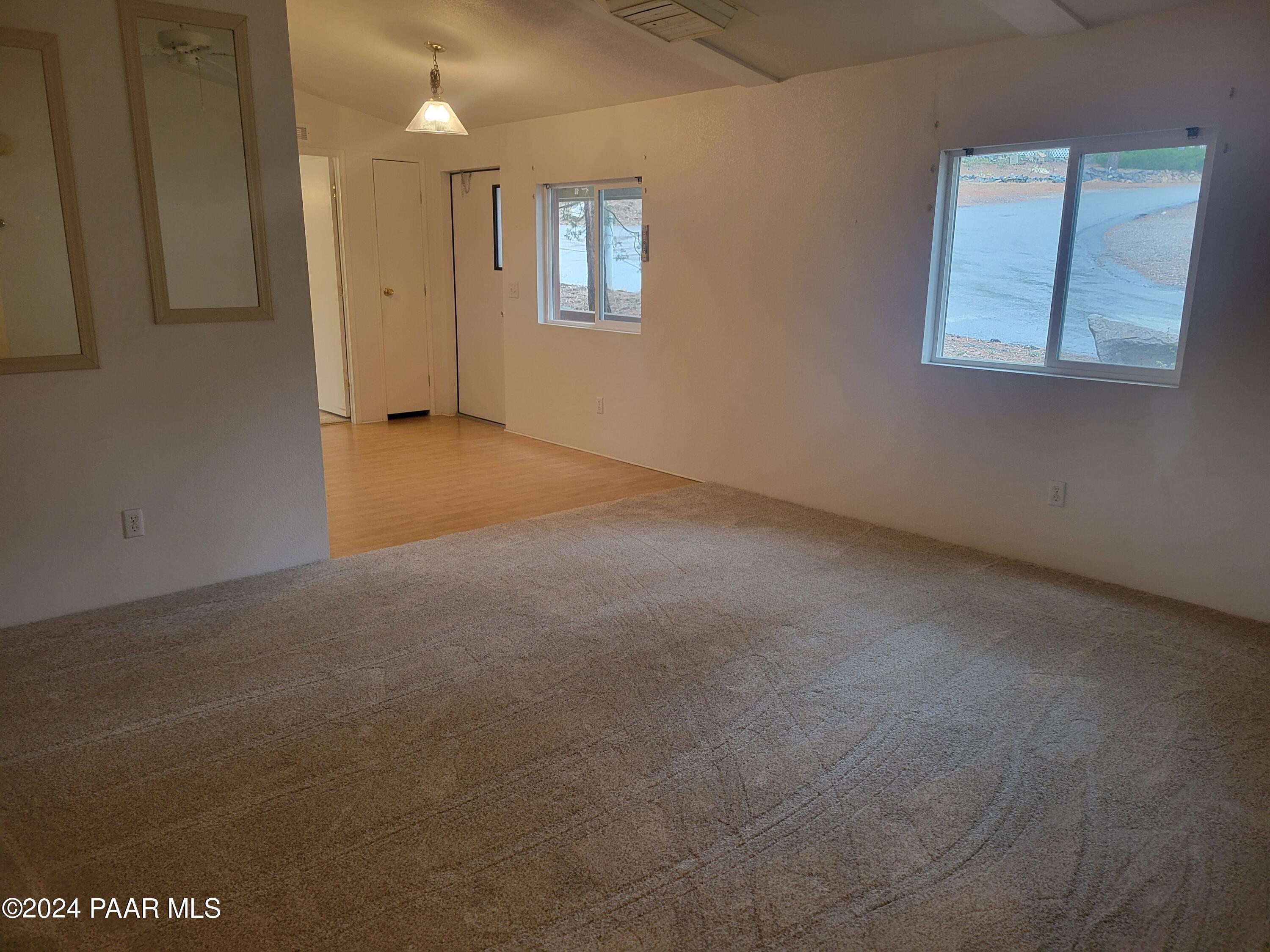 99 Alpine Prescott, AZ 86305 - Photo 5 of 25 a view of an empty room with a window