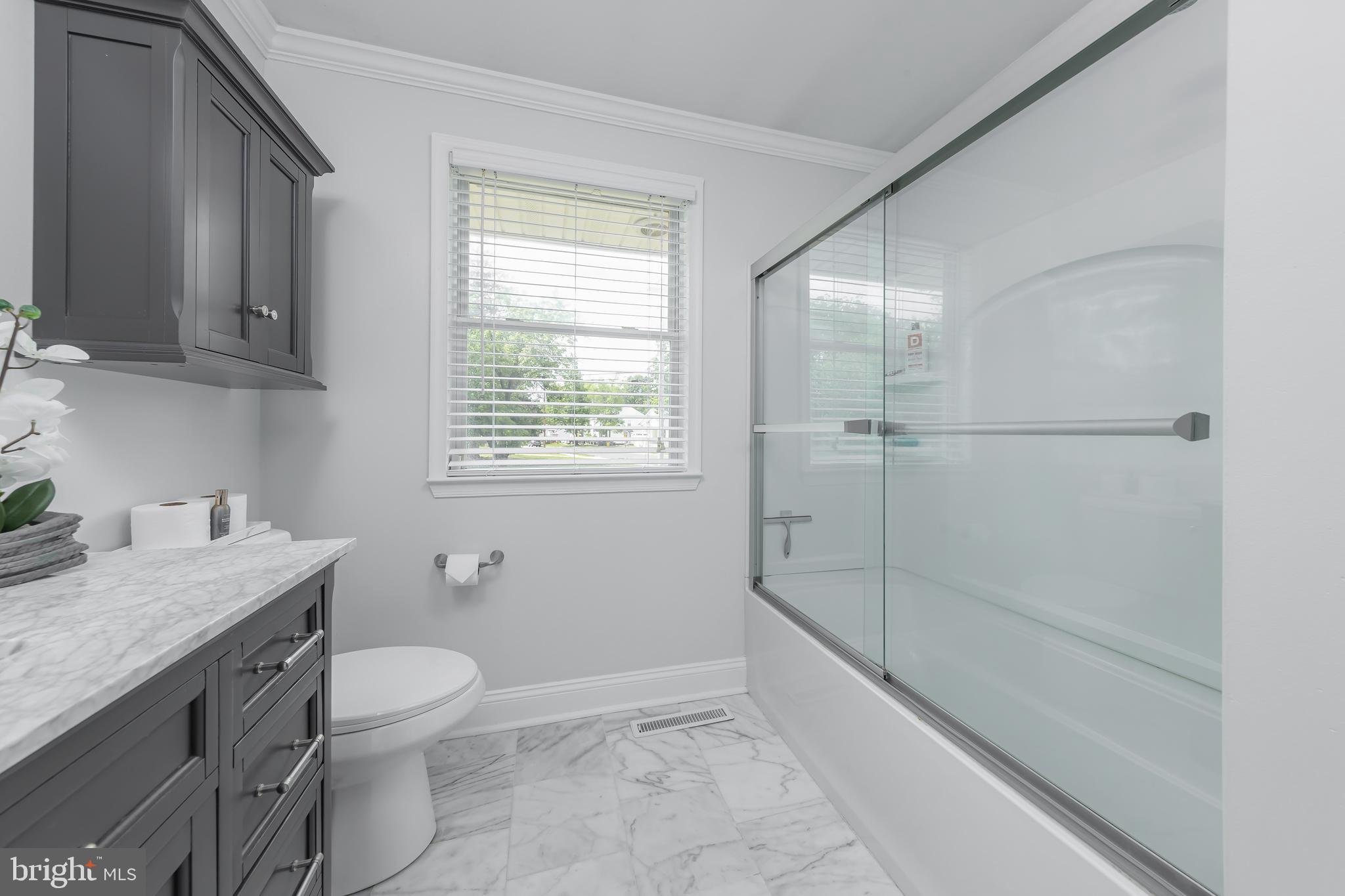31 Hill Drive Pine Hill, NJ 08021 - Photo 11 of 27 a bathroom with a granite countertop sink a toilet and shower