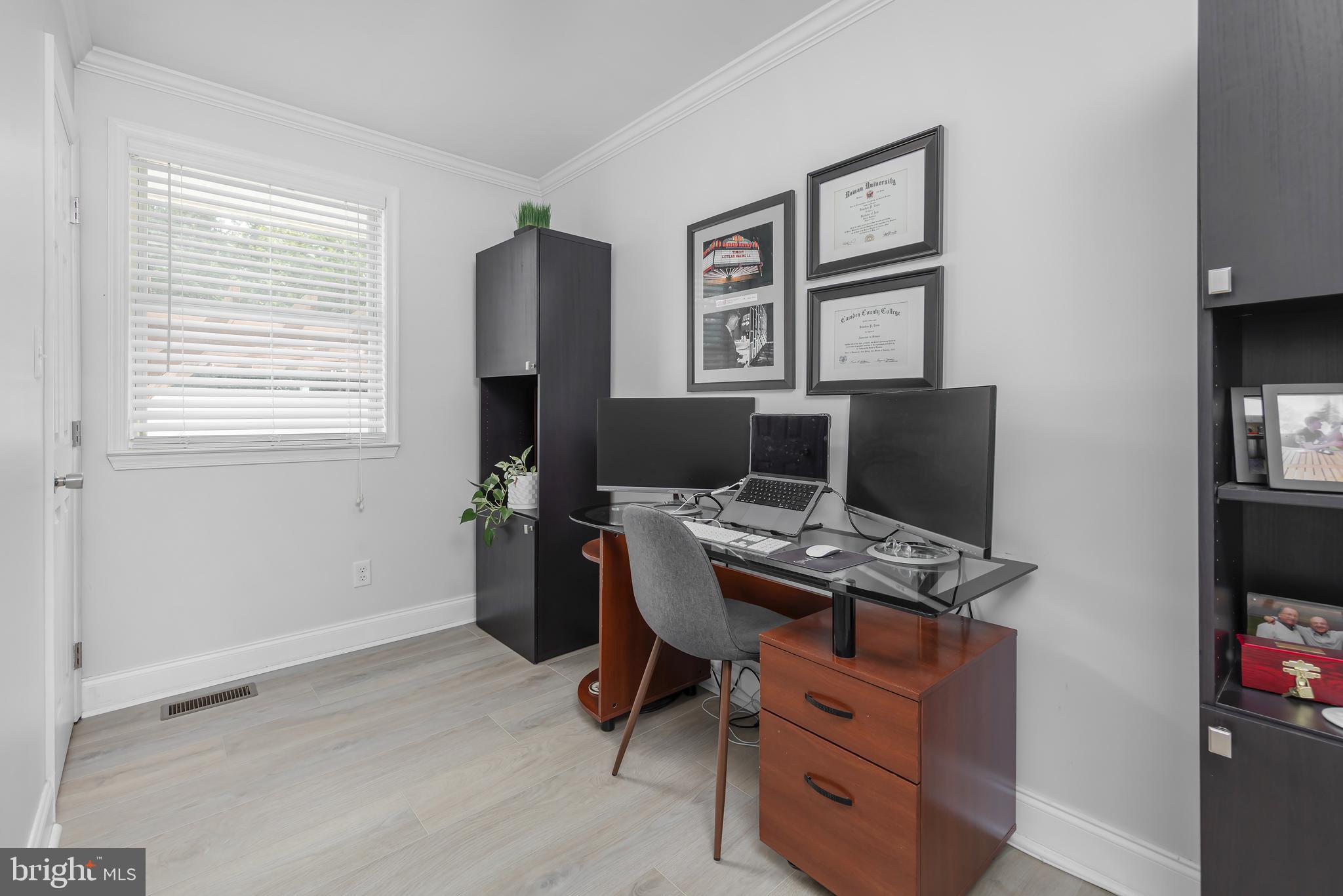 31 Hill Drive Pine Hill, NJ 08021 - Photo 13 of 27 a view of a workspace with furniture and a window