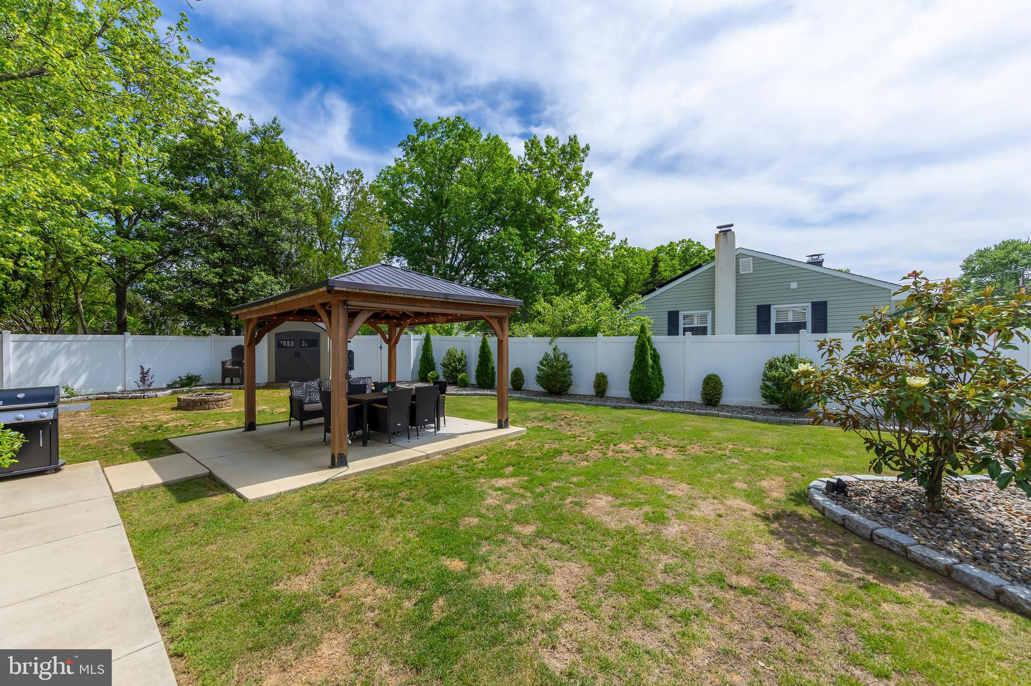 31 Hill Drive Pine Hill, NJ 08021 - Photo 17 of 27 a view of a house with backyard and sitting area