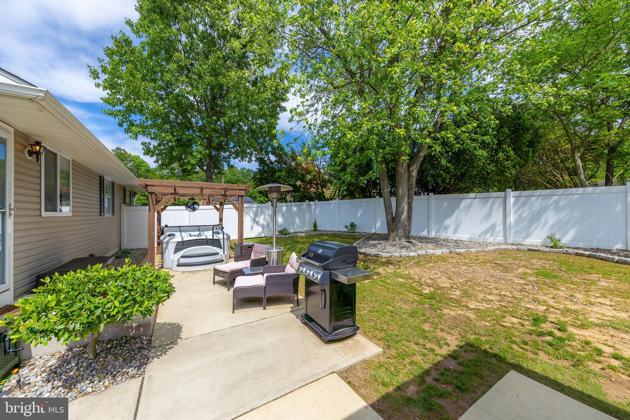 31 Hill Drive Pine Hill, NJ 08021 - Photo 20 of 27 a view of a backyard with chairs and potted plants