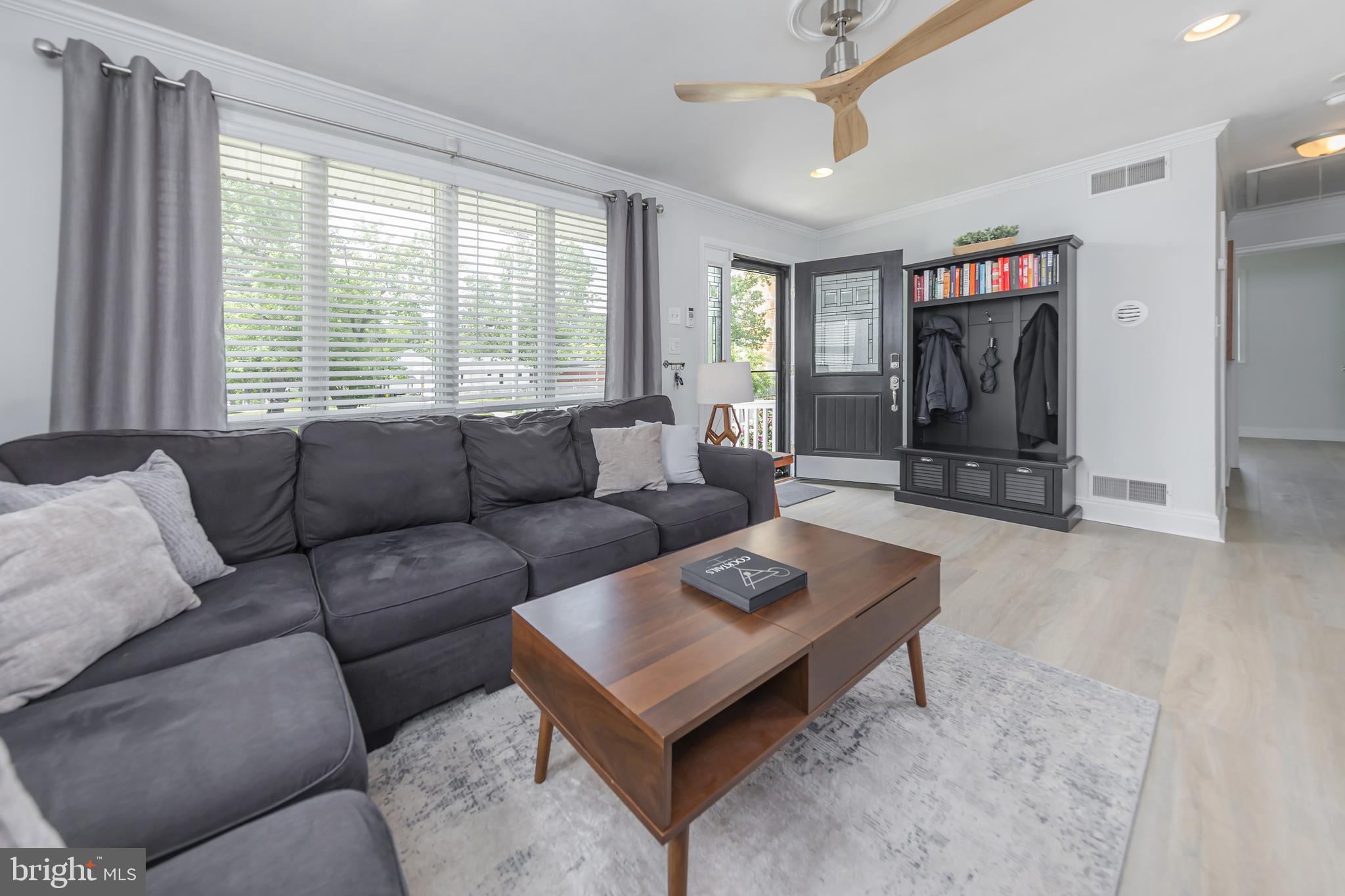 31 Hill Drive Pine Hill, NJ 08021 - Photo 2 of 27 a living room with furniture and a flat screen tv