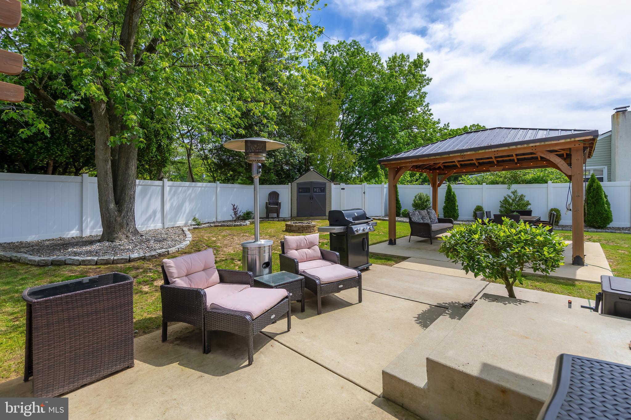 31 Hill Drive Pine Hill, NJ 08021 - Photo 24 of 27 a view of a backyard with sitting area