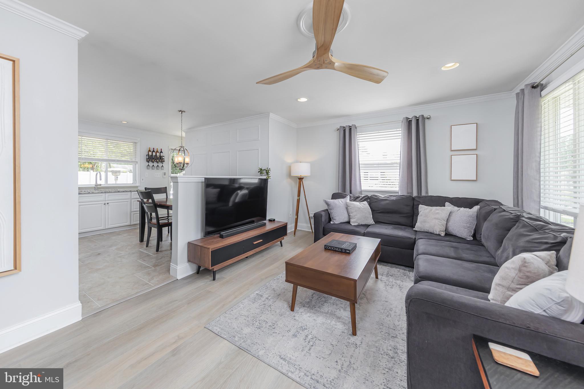 31 Hill Drive Pine Hill, NJ 08021 - Photo 4 of 27 a living room with furniture and a flat screen tv