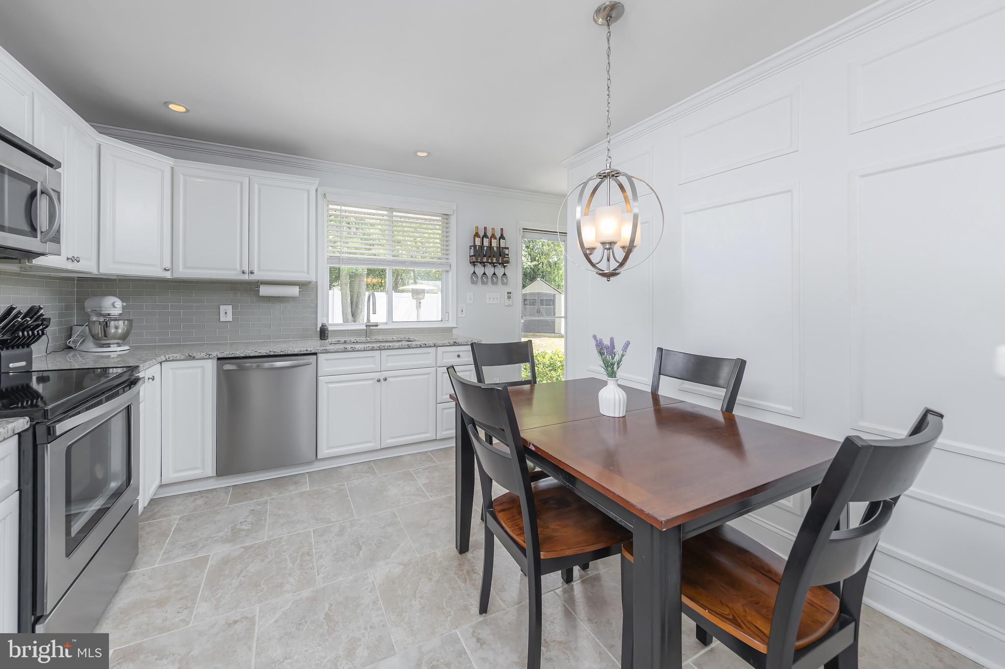 31 Hill Drive Pine Hill, NJ 08021 - Photo 8 of 27 a view of a dining room with furniture and a chandelier
