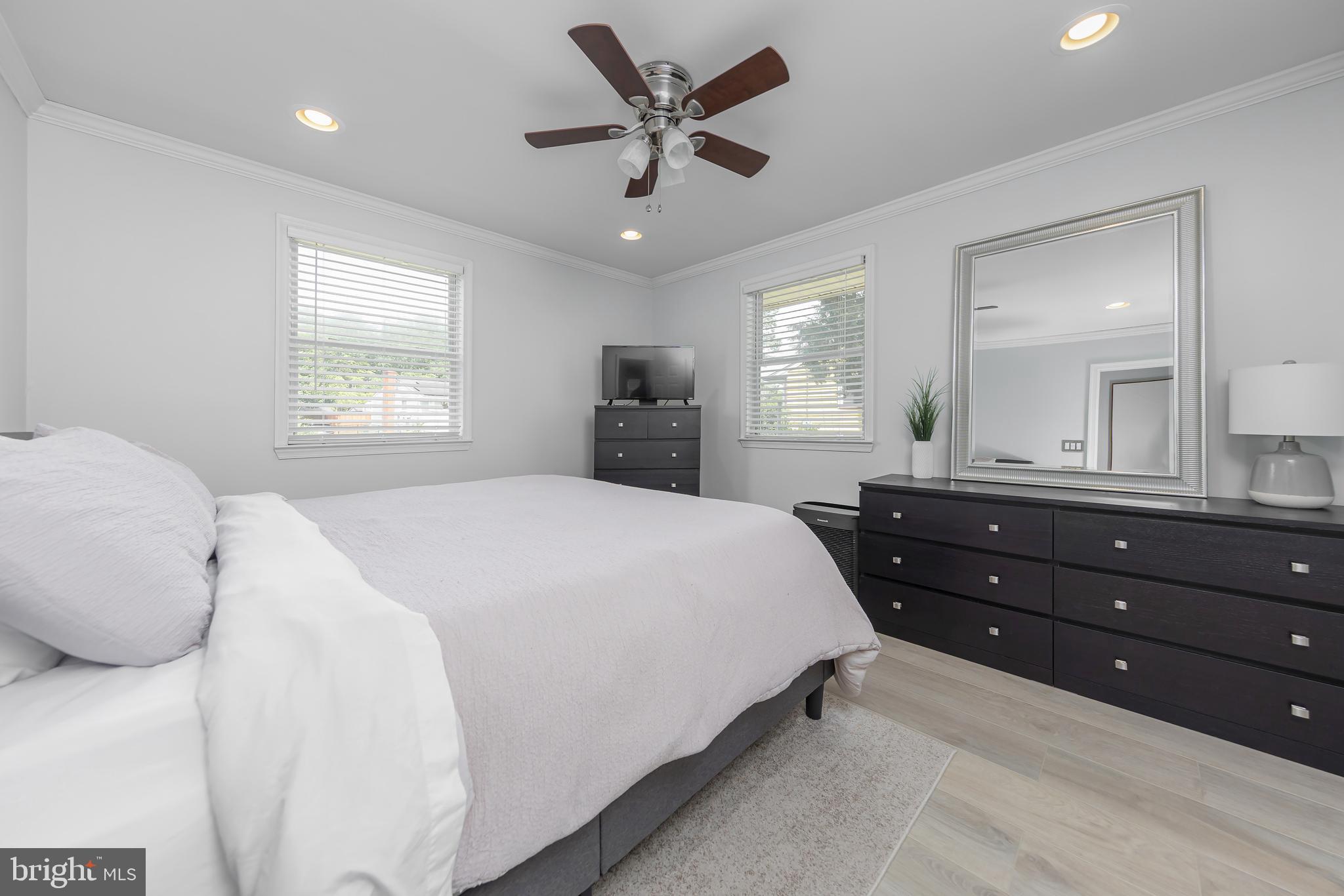 31 Hill Drive Pine Hill, NJ 08021 - Photo 9 of 27 a bedroom with a bed and window