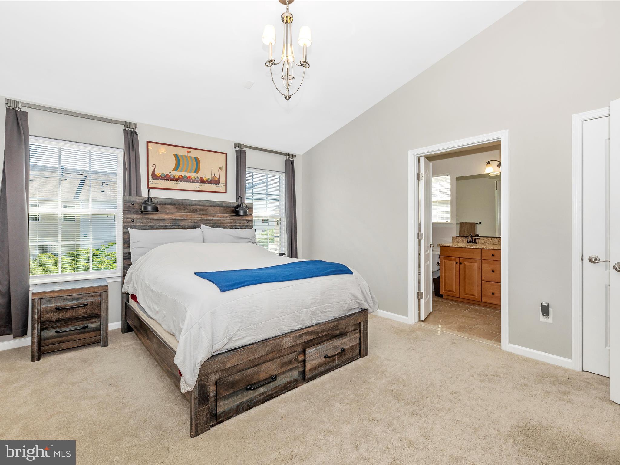 7801 Wormans Mill Road Frederick, MD 21701 - Photo 21 of 35 a bedroom with a bed and a view of kitchen