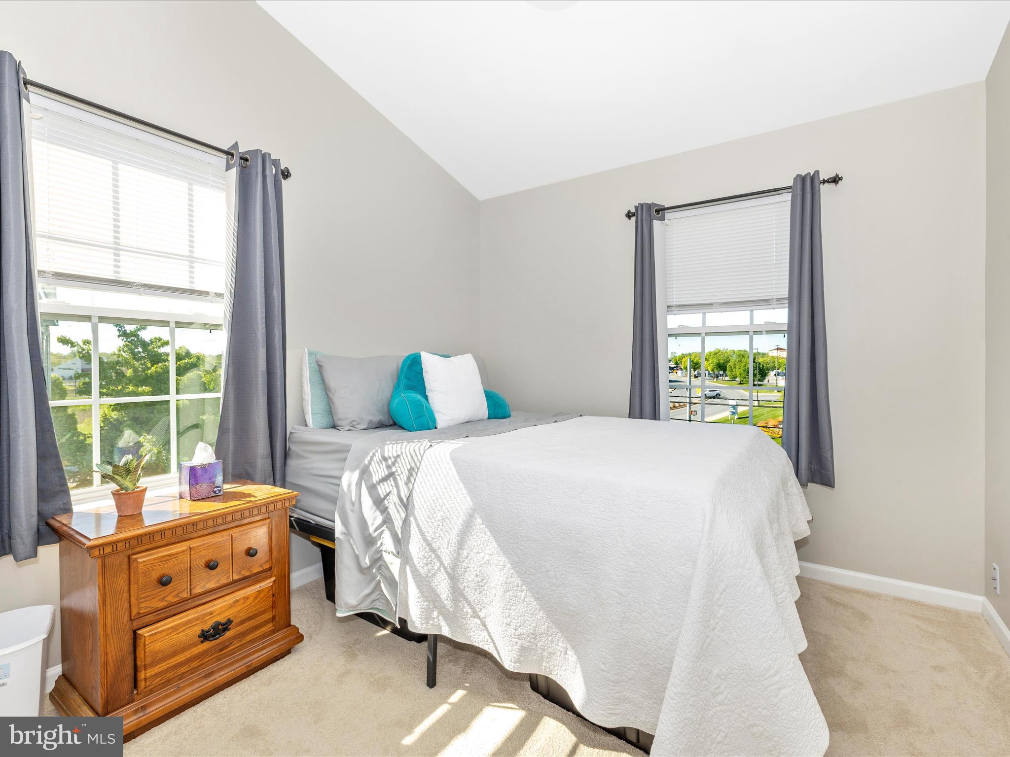 7801 Wormans Mill Road Frederick, MD 21701 - Photo 25 of 35 a bedroom with a bed and a window