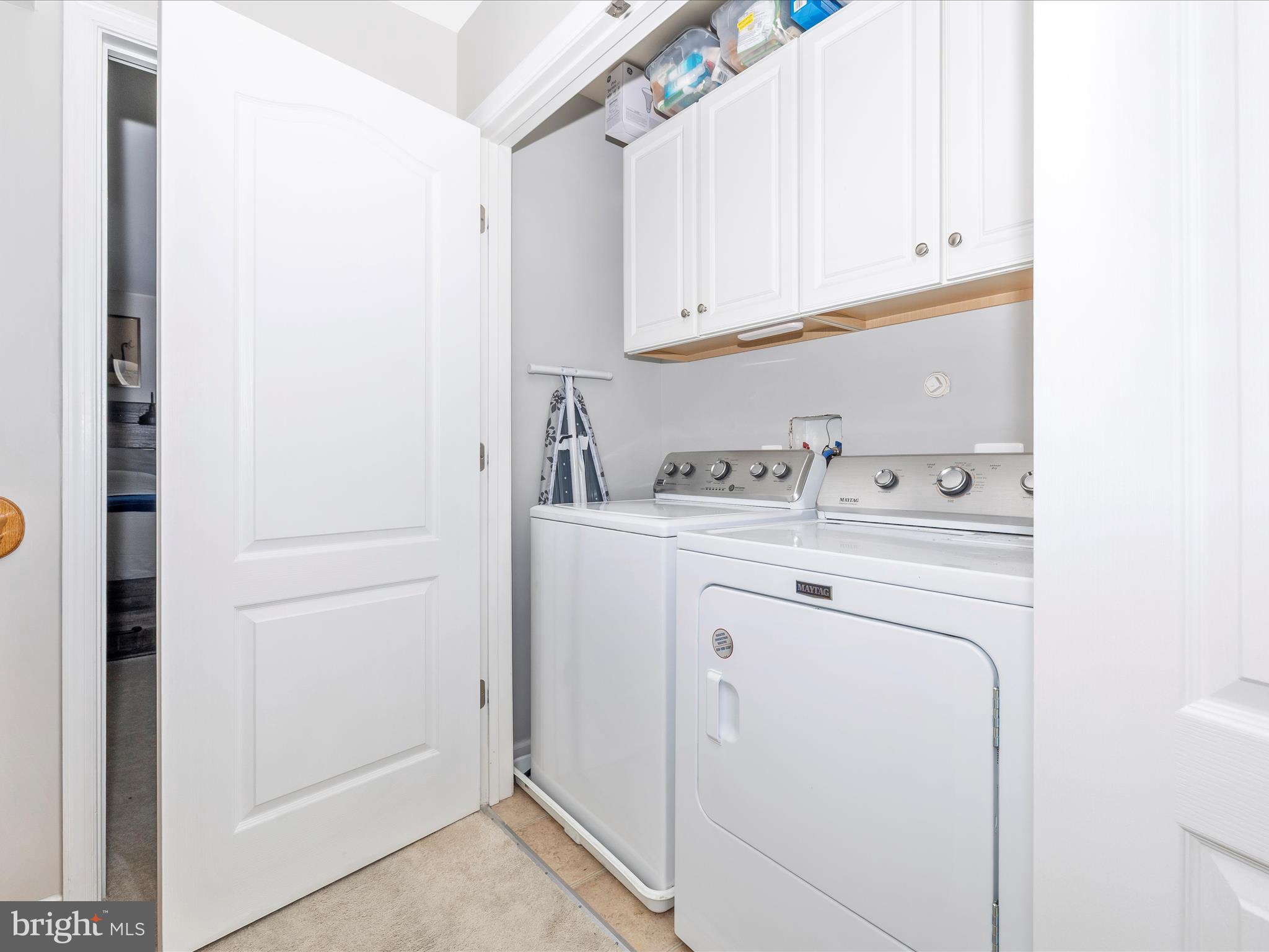 7801 Wormans Mill Road Frederick, MD 21701 - Photo 27 of 35 a utility room with closet dryer and washer