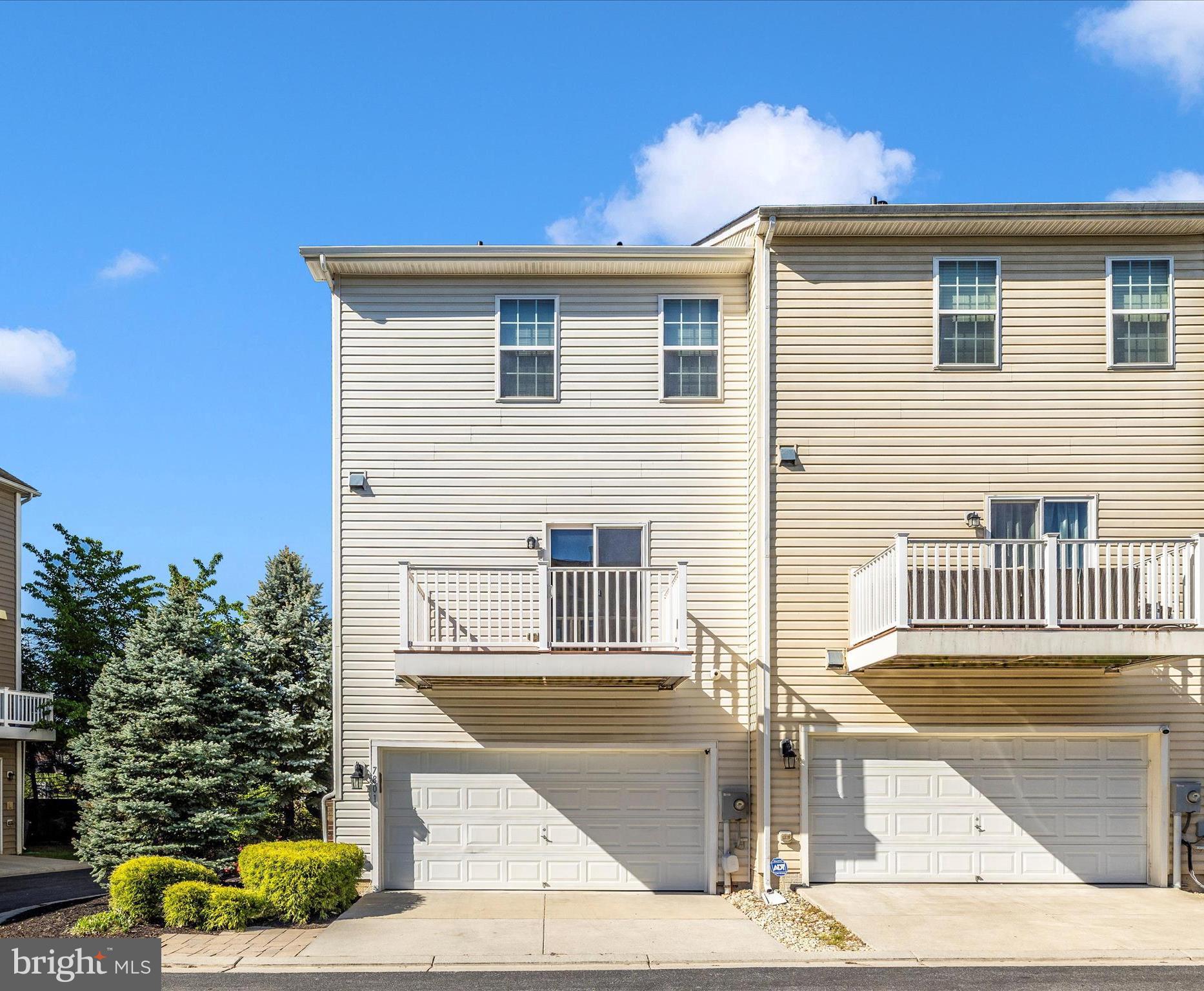 7801 Wormans Mill Road Frederick, MD 21701 - Photo 30 of 35 a front view of a house with garden