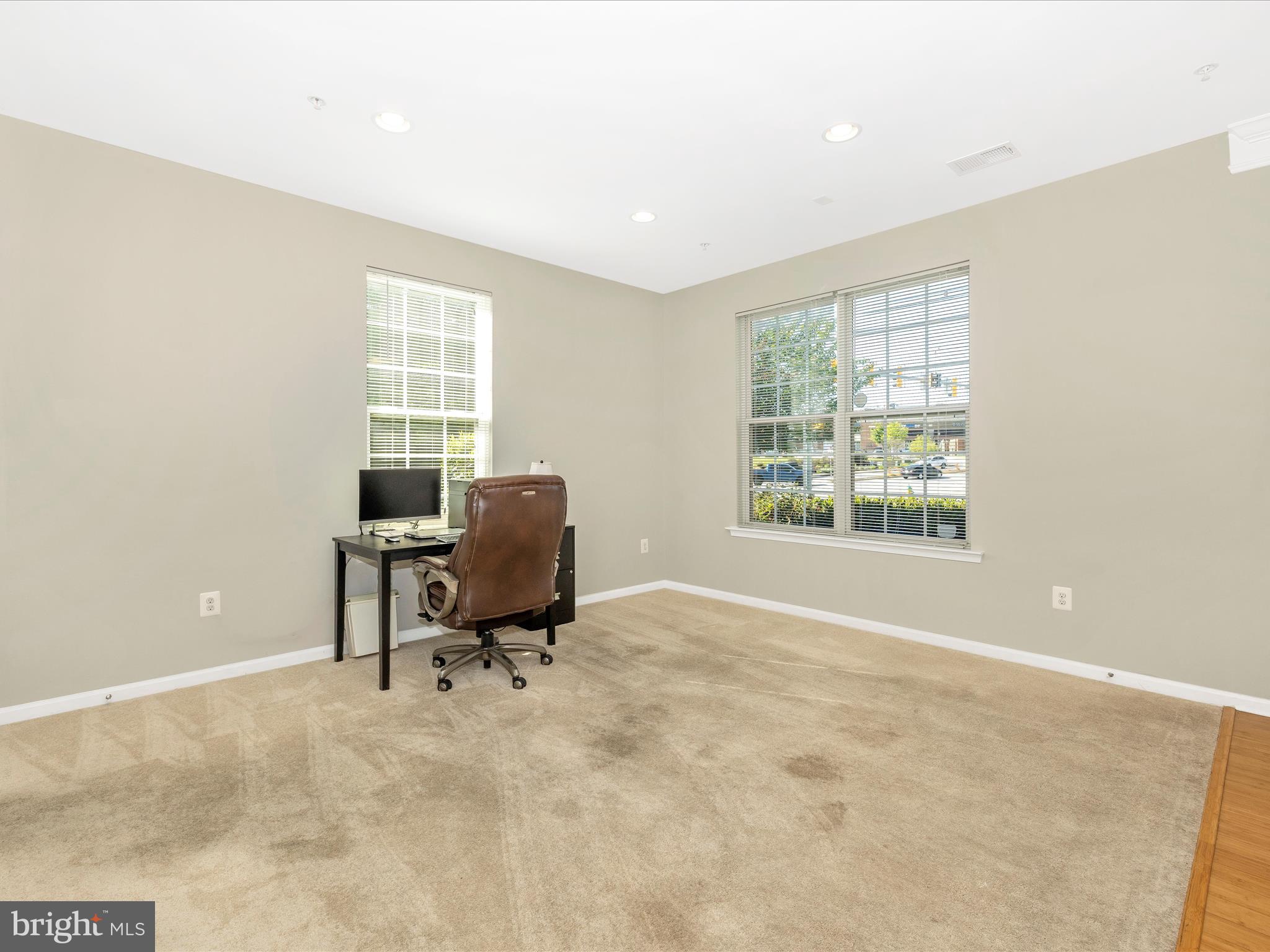 7801 Wormans Mill Road Frederick, MD 21701 - Photo 4 of 35 a workspace with furniture and a window