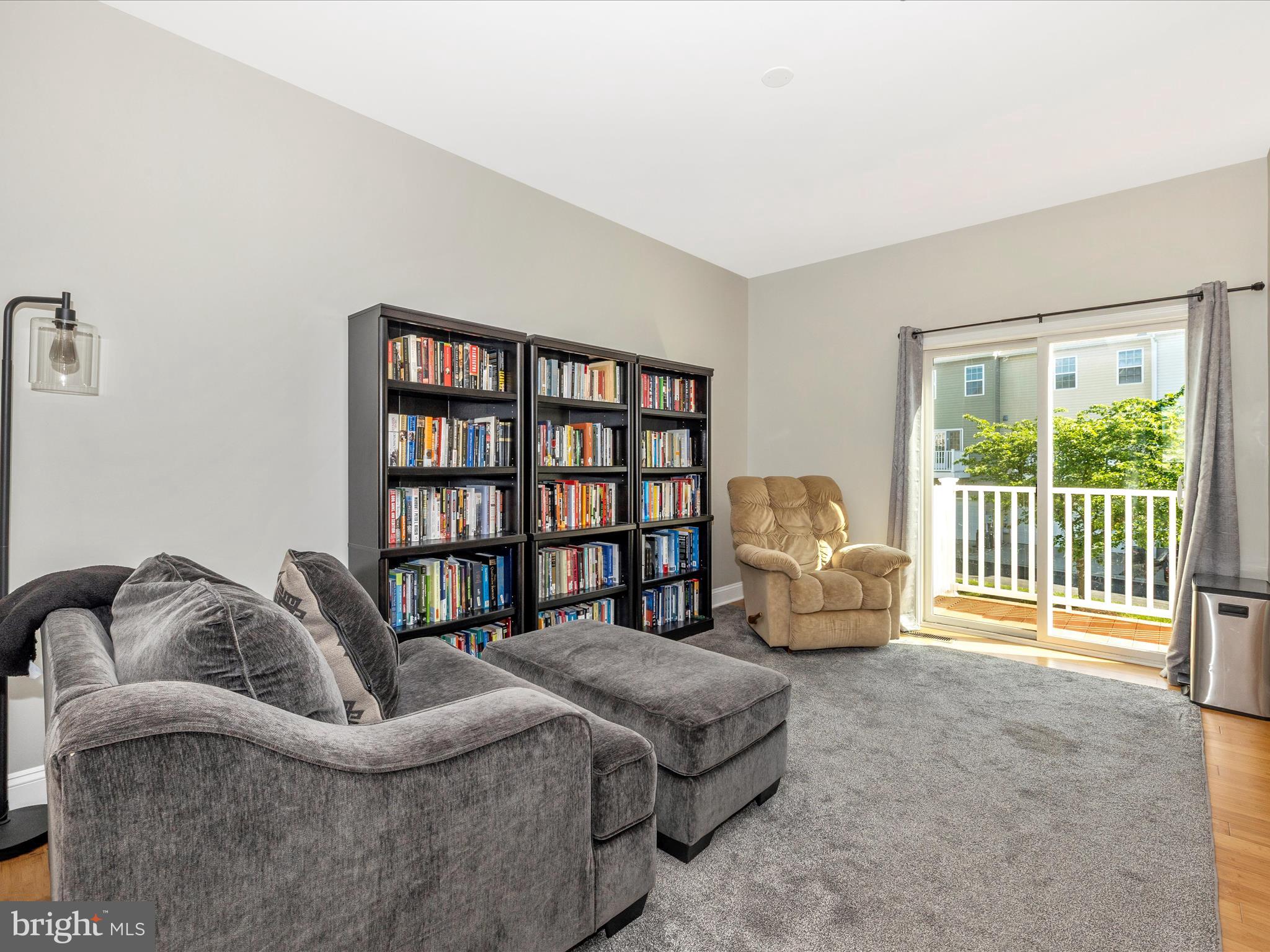7801 Wormans Mill Road Frederick, MD 21701 - Photo 8 of 35 a living room with furniture and a window