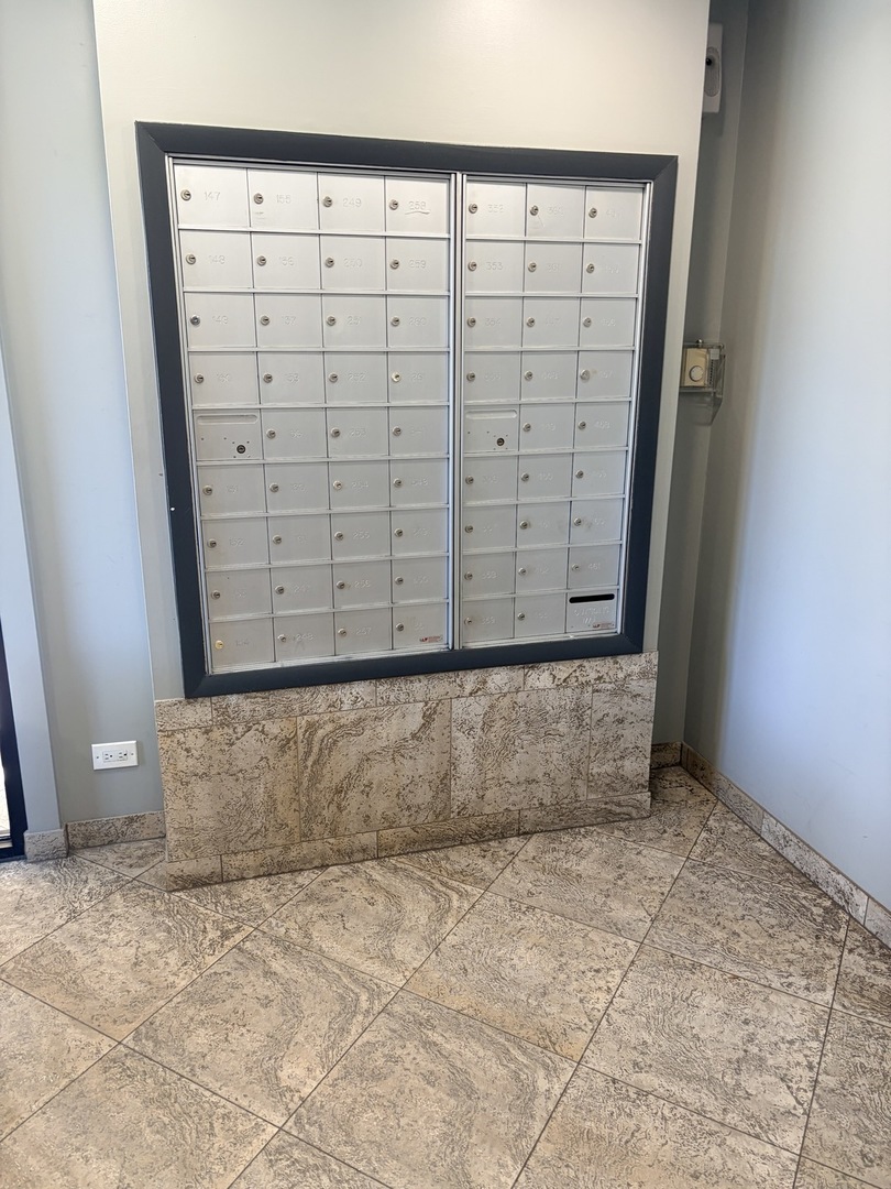 500 West Huntington Commons Road, Unit 255 Mount Prospect, IL 60056 - Photo 5 of 5 a view of a wooden door