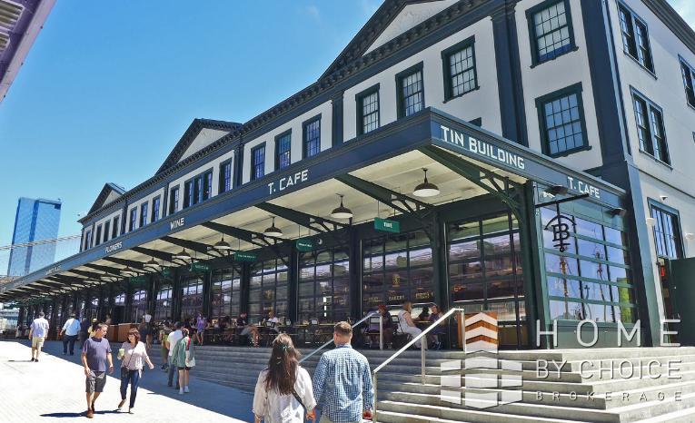 25 Peck Slip, Unit 3 Manhattan, NY 10038 - Photo 4 of 15 a view of a building with a lot of windows