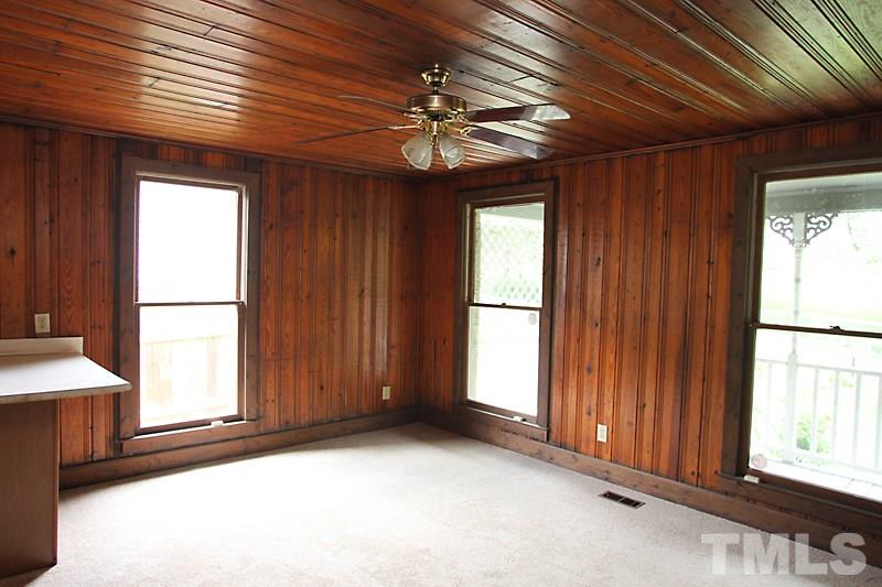 520 Chavis Way Raleigh, NC 27601 - Photo 5 of 13 a view of a livingroom with a chandelier fan and a large window