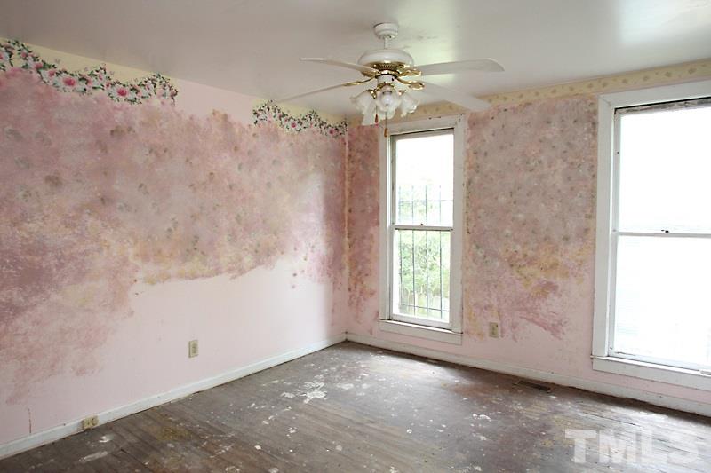 520 Chavis Way Raleigh, NC 27601 - Photo 7 of 13 a view of an empty room with a window