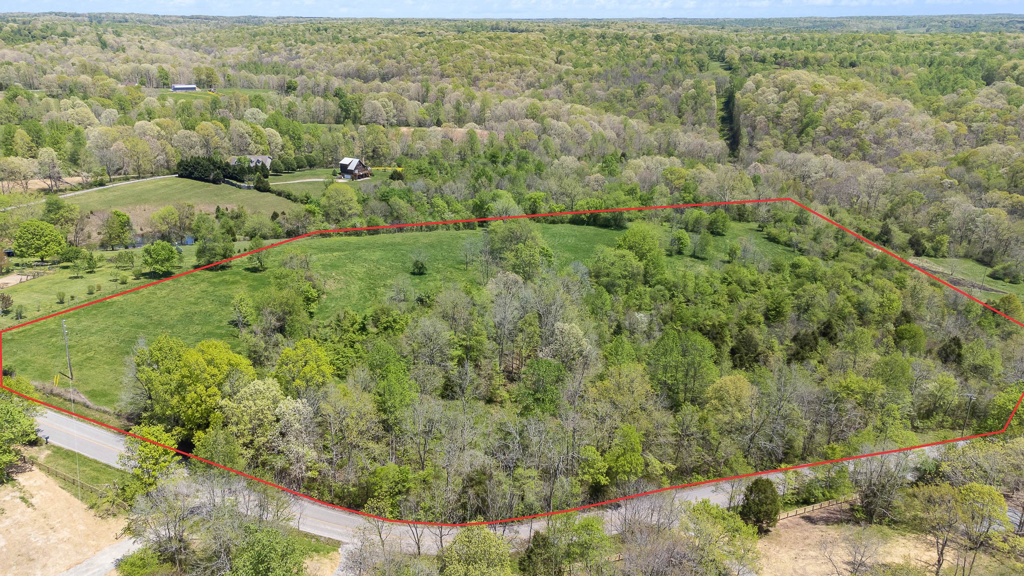 8015 Shoals Branch Road Primm Springs, TN 38476 - Photo 4 of 13 an aerial view of a house with a yard