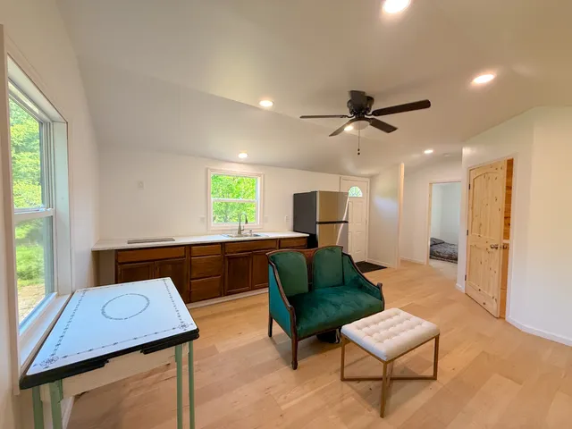 a living room with furniture and a window