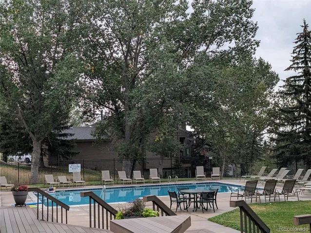 a view of a town with large trees