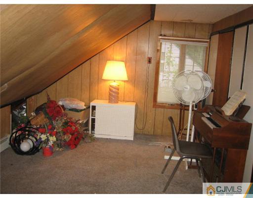 10 Mercury Road Edison, NJ 08817 - Photo 8 of 12 a view of a room with gym equipment
