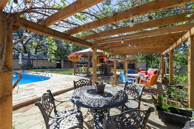 a view of a chairs and tables in patio