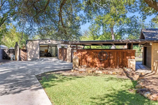 a view of a porch with wooden floor