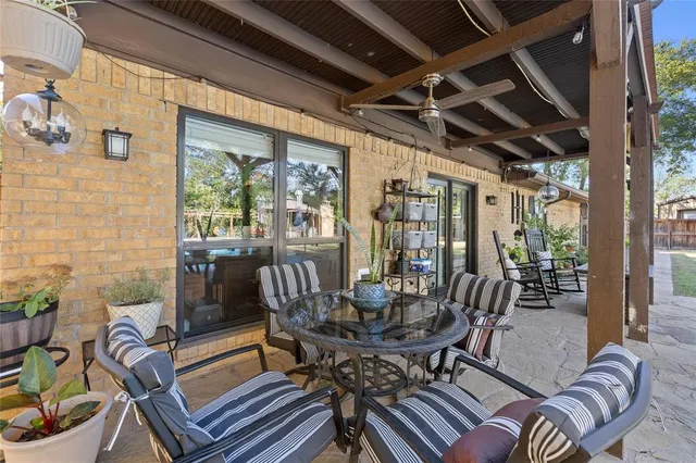 a outdoor dining space with furniture
