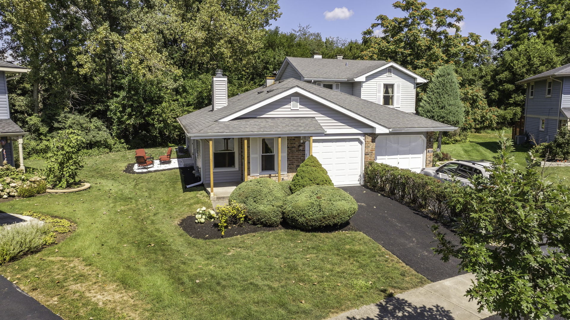 1520 Lighthouse Drive Naperville, IL 60565 - Photo 1 of 36 a house with green field in front of it