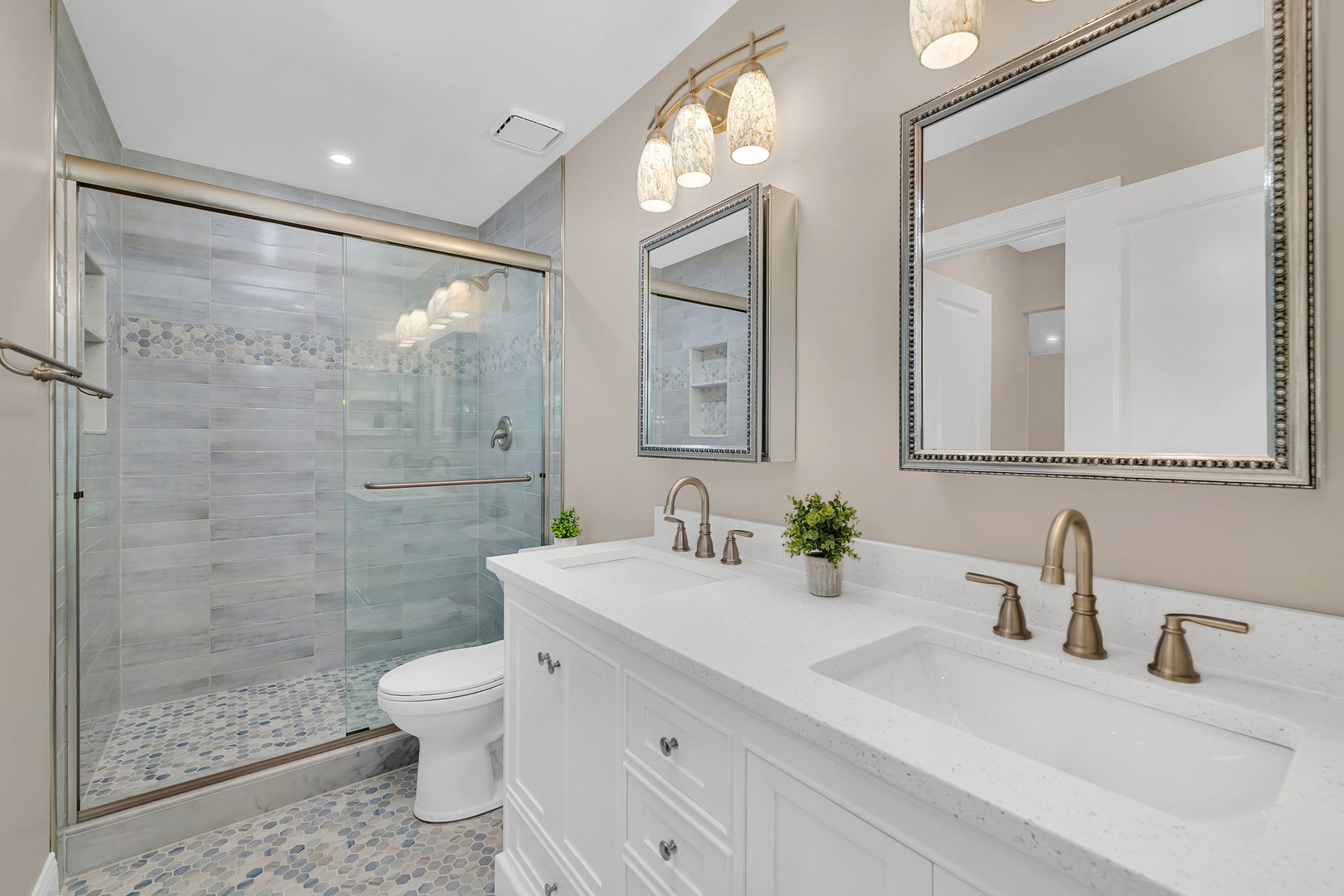 1520 Lighthouse Drive Naperville, IL 60565 - Photo 21 of 36 a bathroom with a double vanity sink mirror and toilet