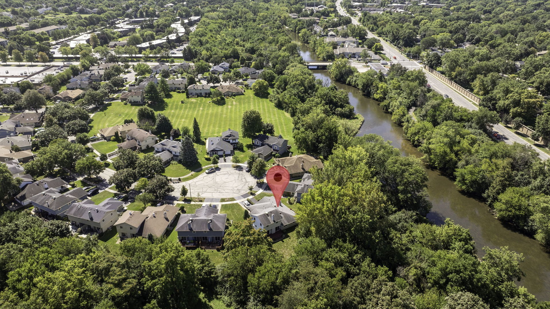 1520 Lighthouse Drive Naperville, IL 60565 - Photo 34 of 36 a view of a lake with a building