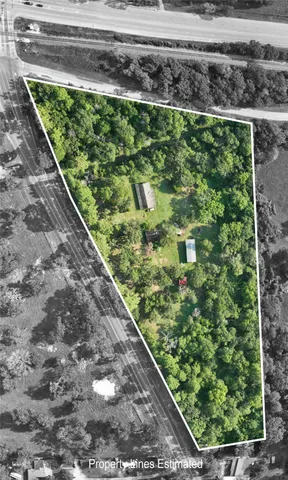 a view of a garden with a pathway