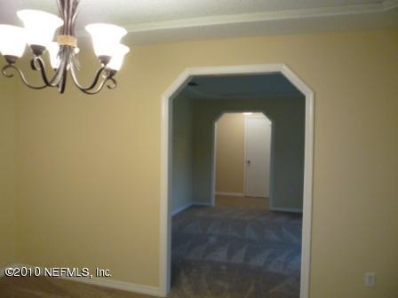 901 Ridgeway Court Orange Park, FL 32065 - Photo 8 of 20 Looking at the living room and foyer fro