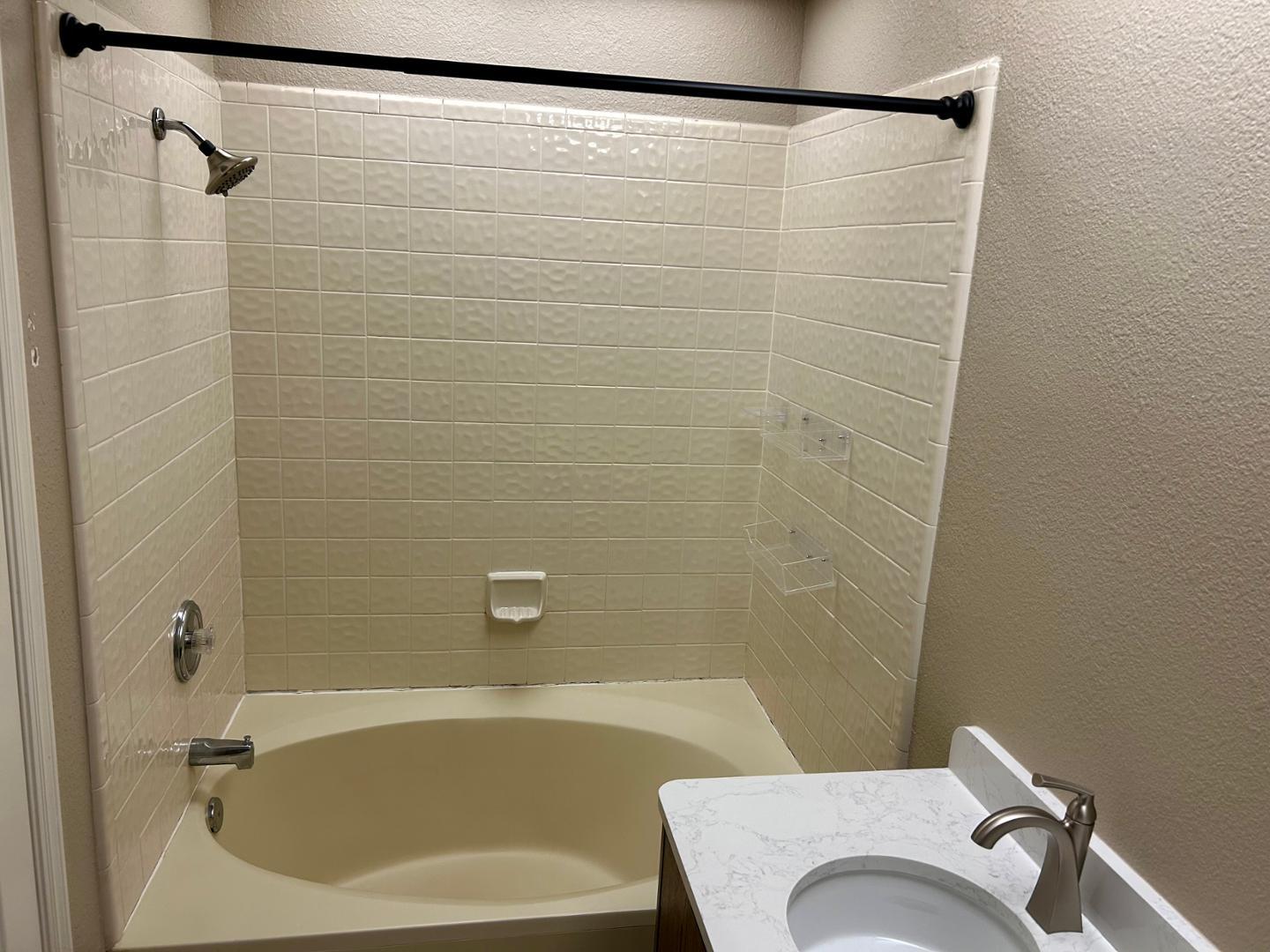10015 East Mountain View Road, Unit 2009 Scottsdale, AZ 85258 - Photo 13 of 18 a bathroom with a sink and a shower