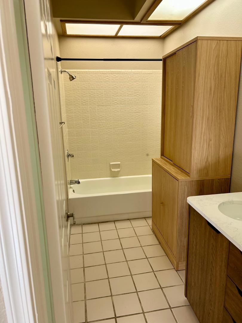 10015 East Mountain View Road, Unit 2009 Scottsdale, AZ 85258 - Photo 17 of 18 a bathroom with a bathtub and a shower