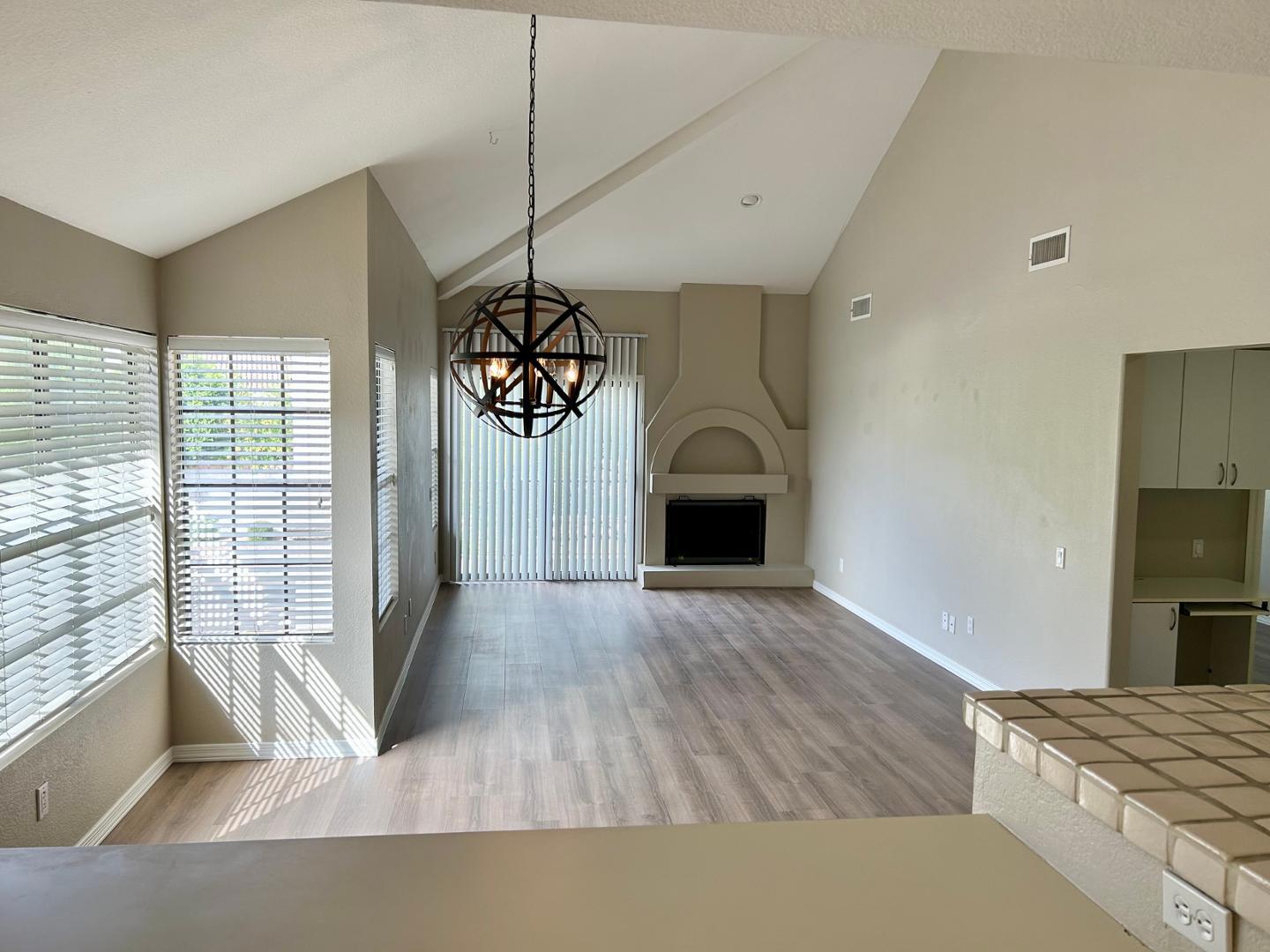 10015 East Mountain View Road, Unit 2009 Scottsdale, AZ 85258 - Photo 6 of 18 a view of livingroom with furniture and chandelier