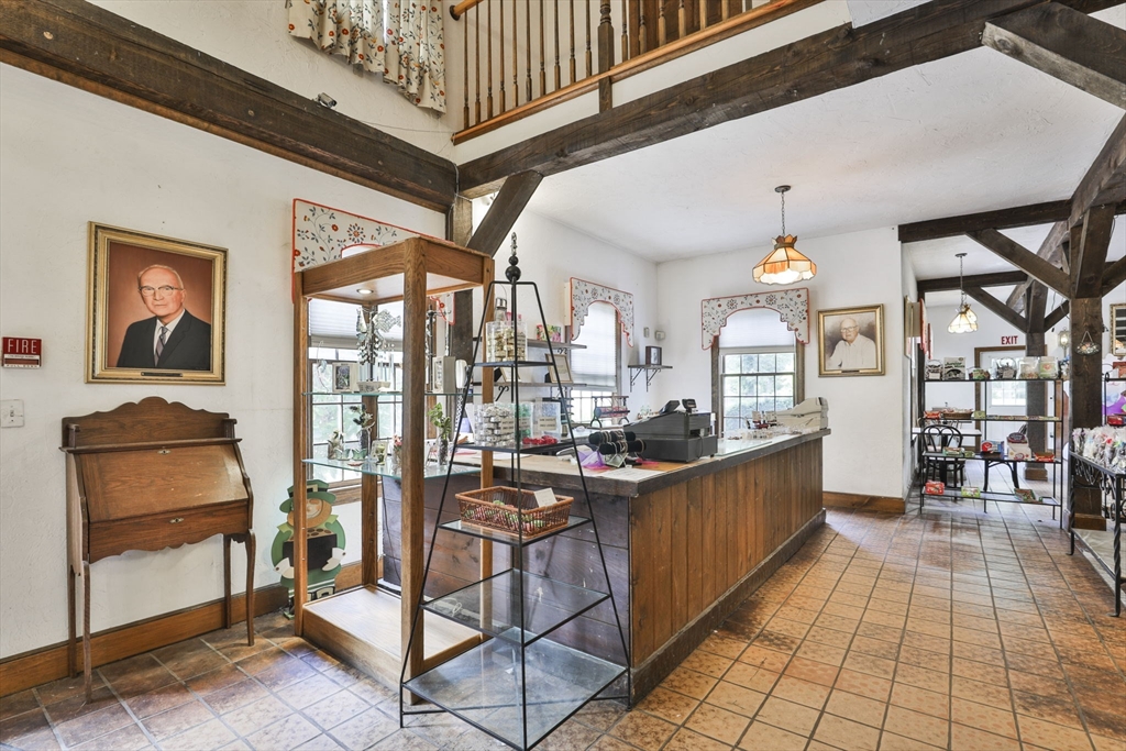47 Sugar Road Bolton, MA 01740 - Photo 11 of 42 a view of a porch with furniture