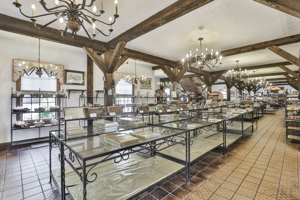 47 Sugar Road Bolton, MA 01740 - Photo 13 of 42 a very nice looking dining room with a table and chairs