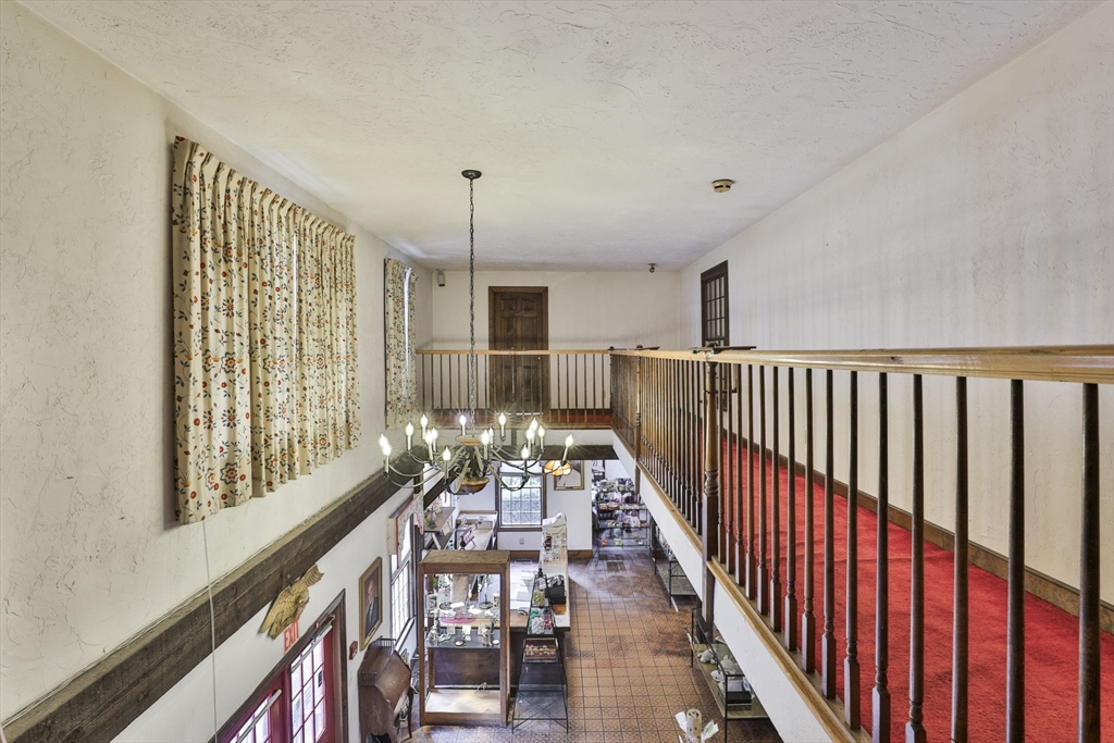 47 Sugar Road Bolton, MA 01740 - Photo 19 of 42 a view of entryway with wooden floor