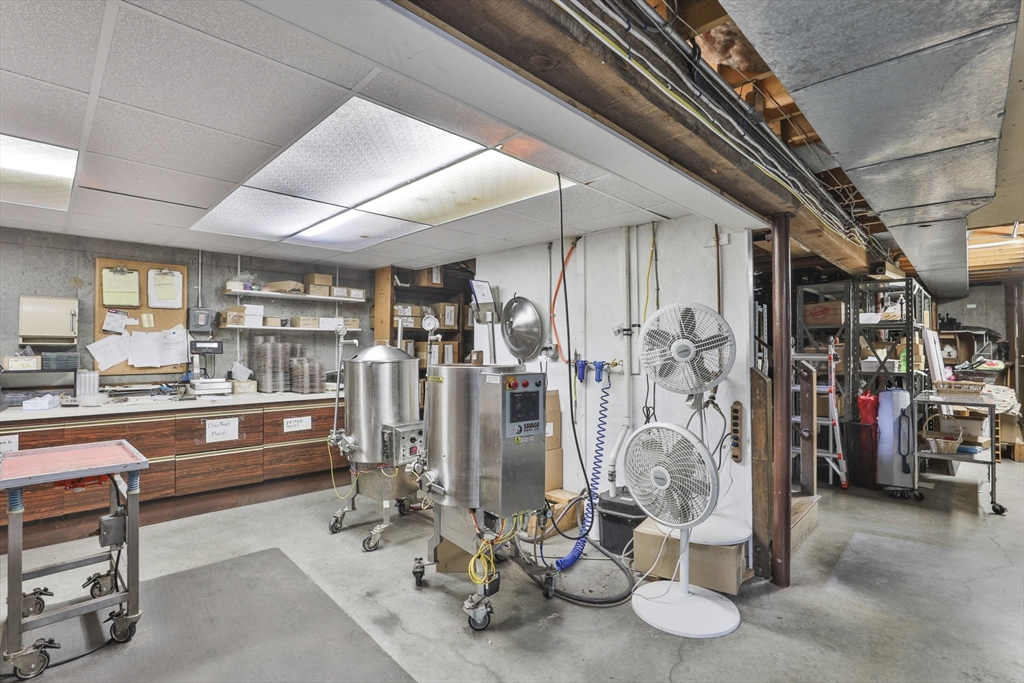 47 Sugar Road Bolton, MA 01740 - Photo 23 of 42 a view of a room with gym equipment