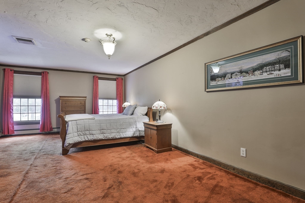 47 Sugar Road Bolton, MA 01740 - Photo 33 of 42 a bedroom with a bed and window