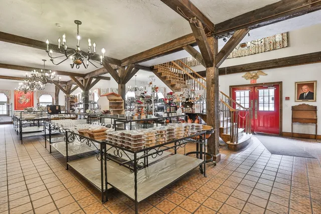 a view of a chairs and tables in a patio