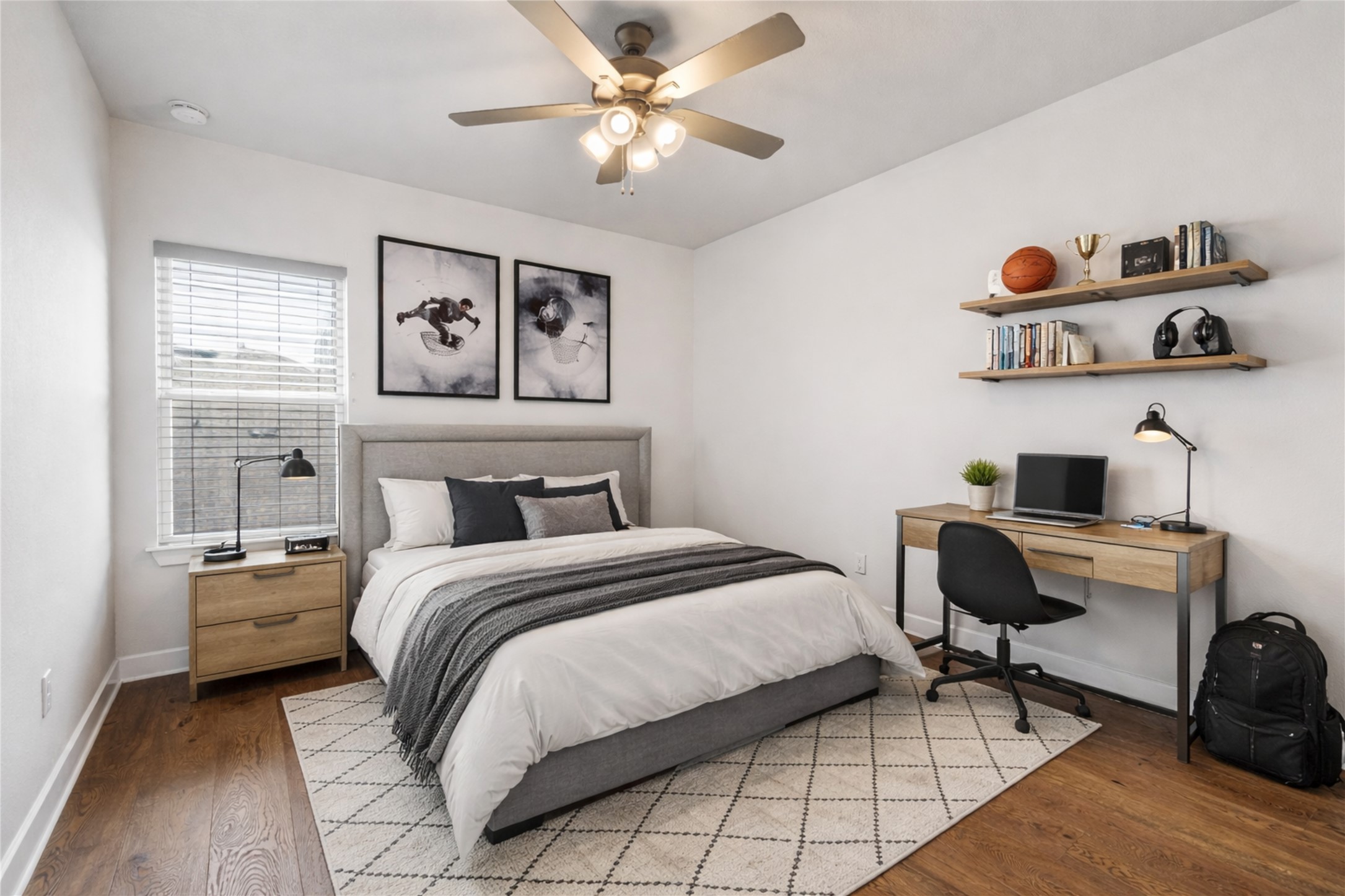 108 Rio Vista Drive Georgetown, TX 78626 - Photo 31 of 40 a bedroom with a bed and a chandelier