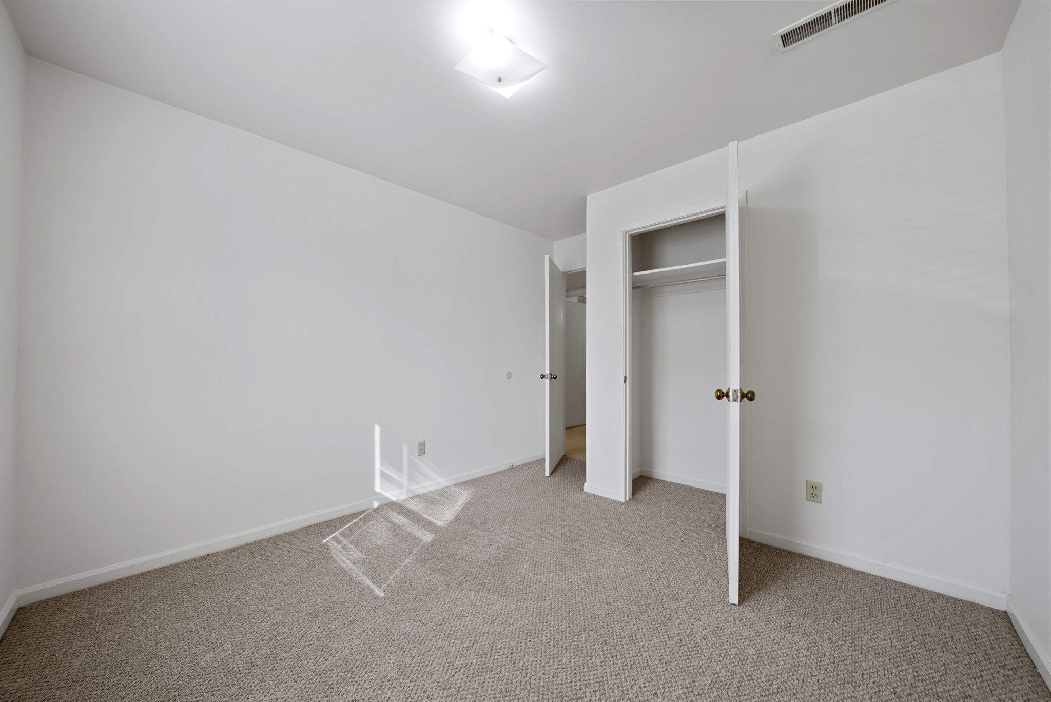 2830 Greenville Road, Unit C4 Hopkinsville, KY 42240 - Photo 13 of 18 an empty room with closet area