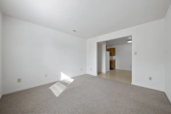a view of a room with an empty space
