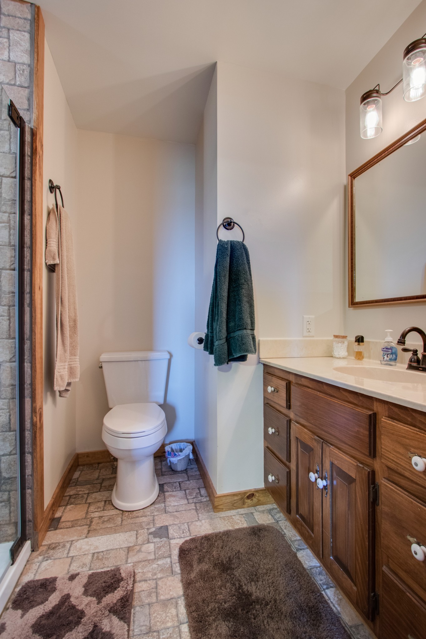 25 Cages Bend Lane Riddleton, TN 37151 - Photo 44 of 50 a bathroom with a toilet sink and mirror