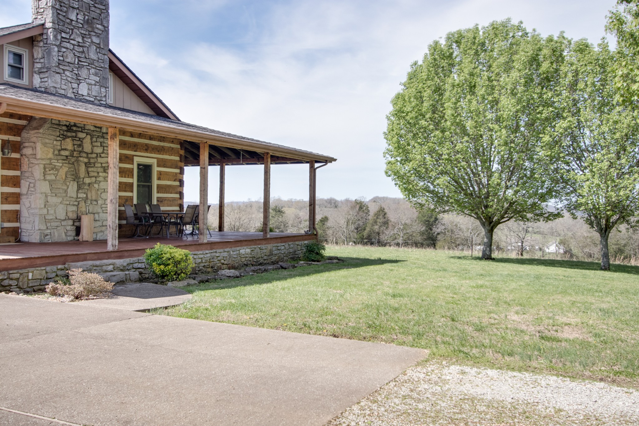 25 Cages Bend Lane Riddleton, TN 37151 - Photo 6 of 50 a front view of a house with garden