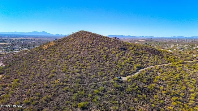 a view of a city with a mountain